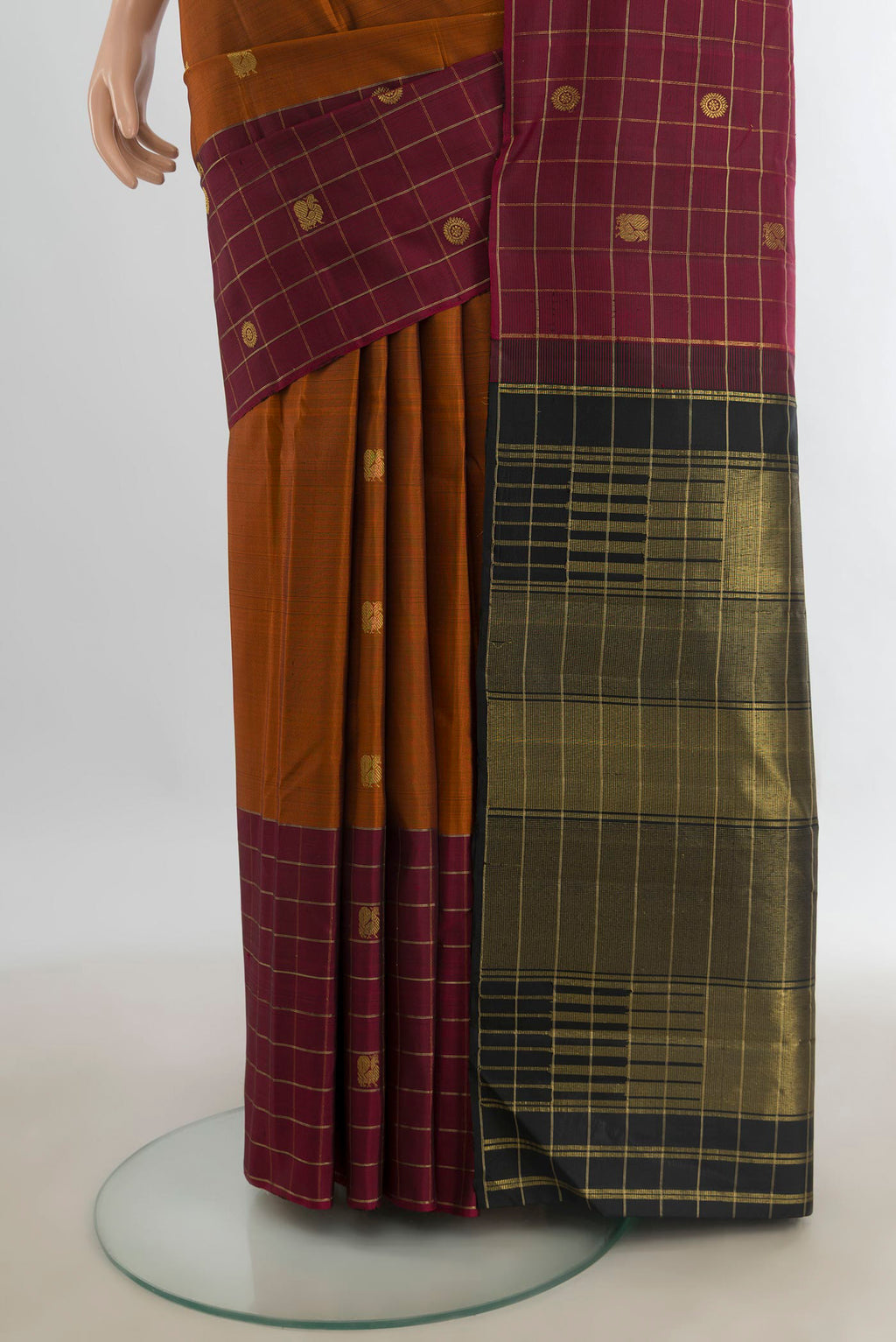 Pleats and pallu of Pure Silk Multi Color Kanjivaram Saree with Zari Butta on the body and Silk Border. 