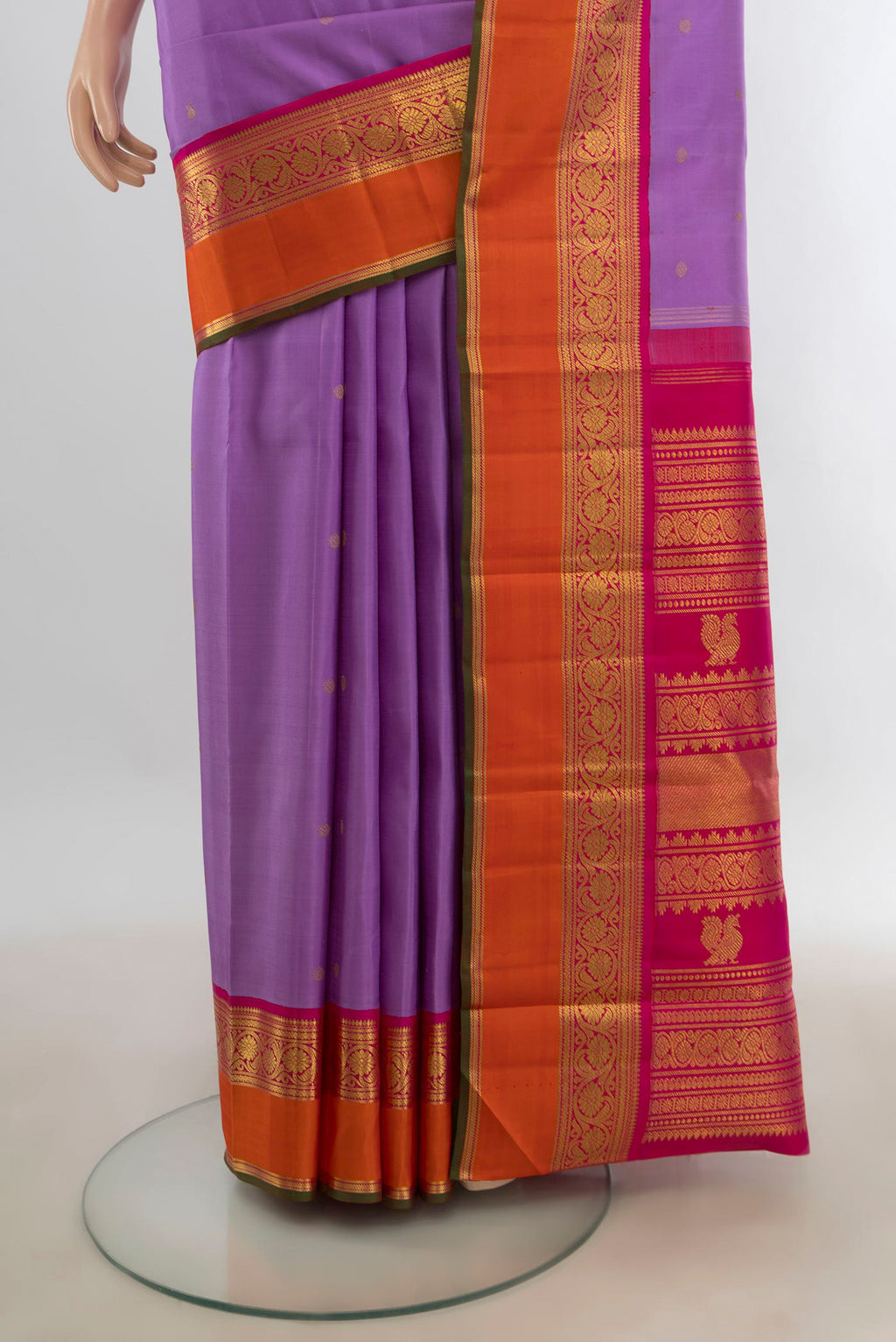Pleats and pallu of Pure Silk Pure Zari Lavender Kanjivaram Saree with Zari Butta on the body and Silk Border. 