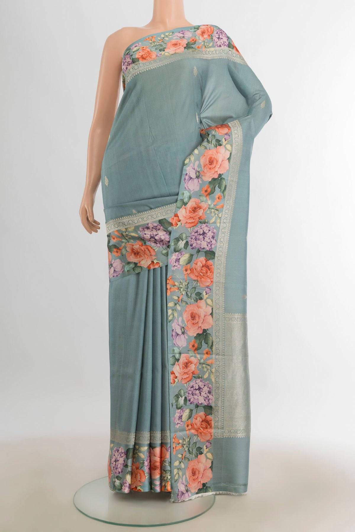 Burgundy Tussar Saree with Floral Print on the body and Silk Border.  displayed on a mannequin