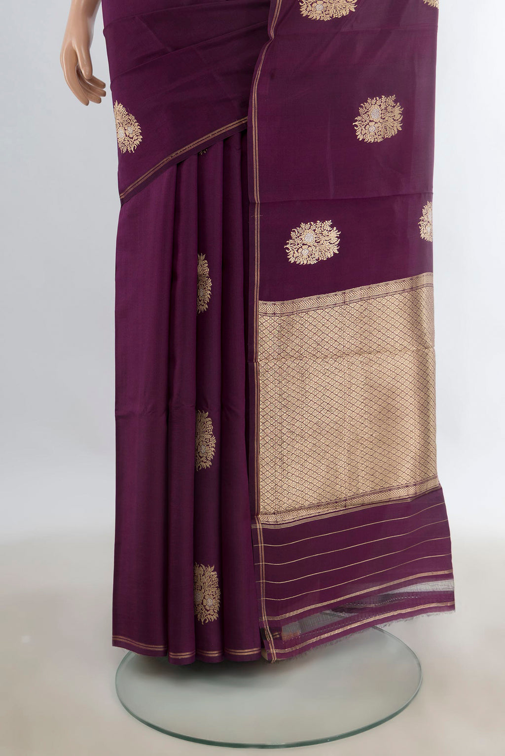 Pleats and pallu of Pure Silk Purple Banarasi Katan Saree with Zari Butta on the body and Zari Border. 