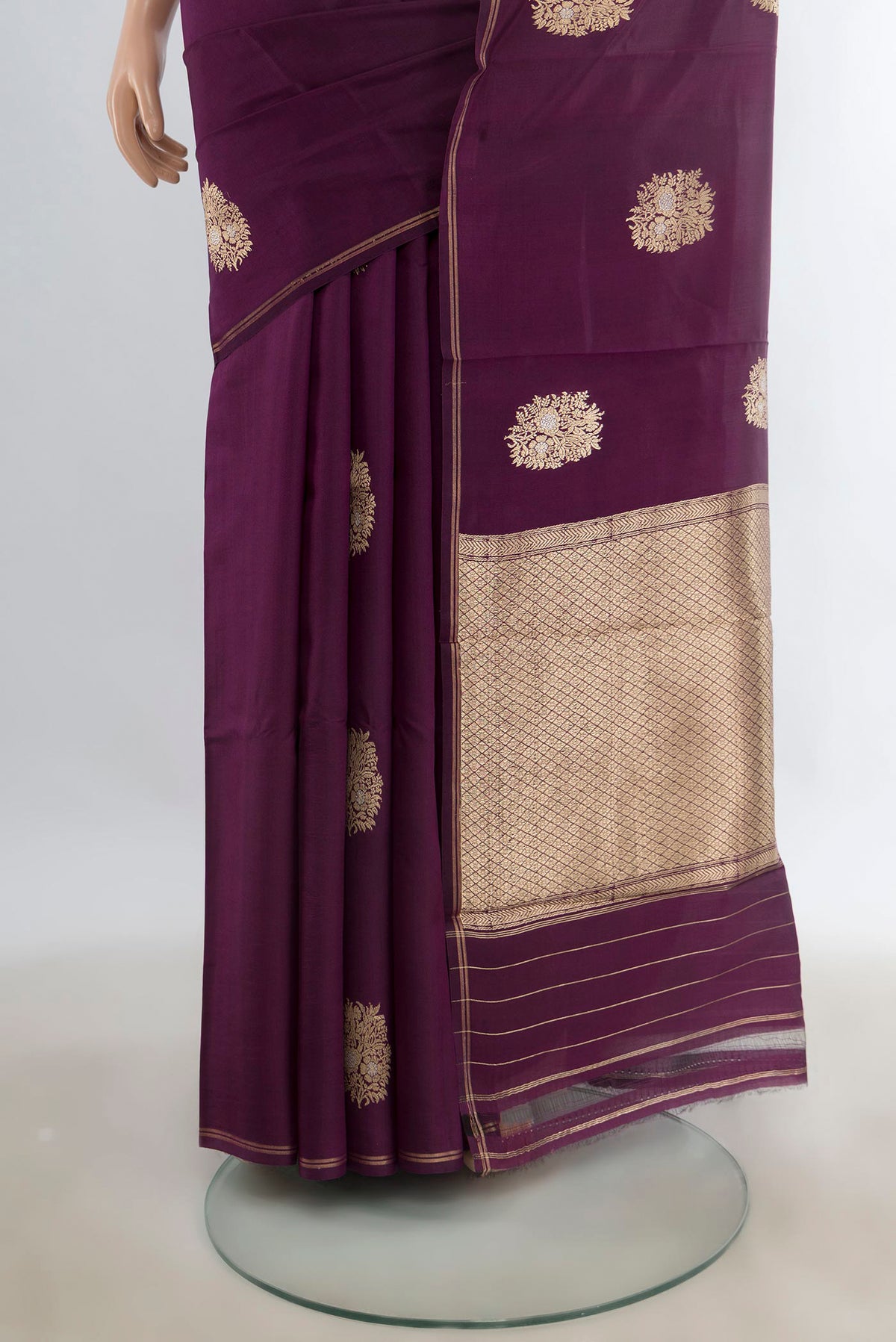 Pleats and pallu of Pure Silk Purple Banarasi Katan Saree with Zari Butta on the body and Zari Border. 