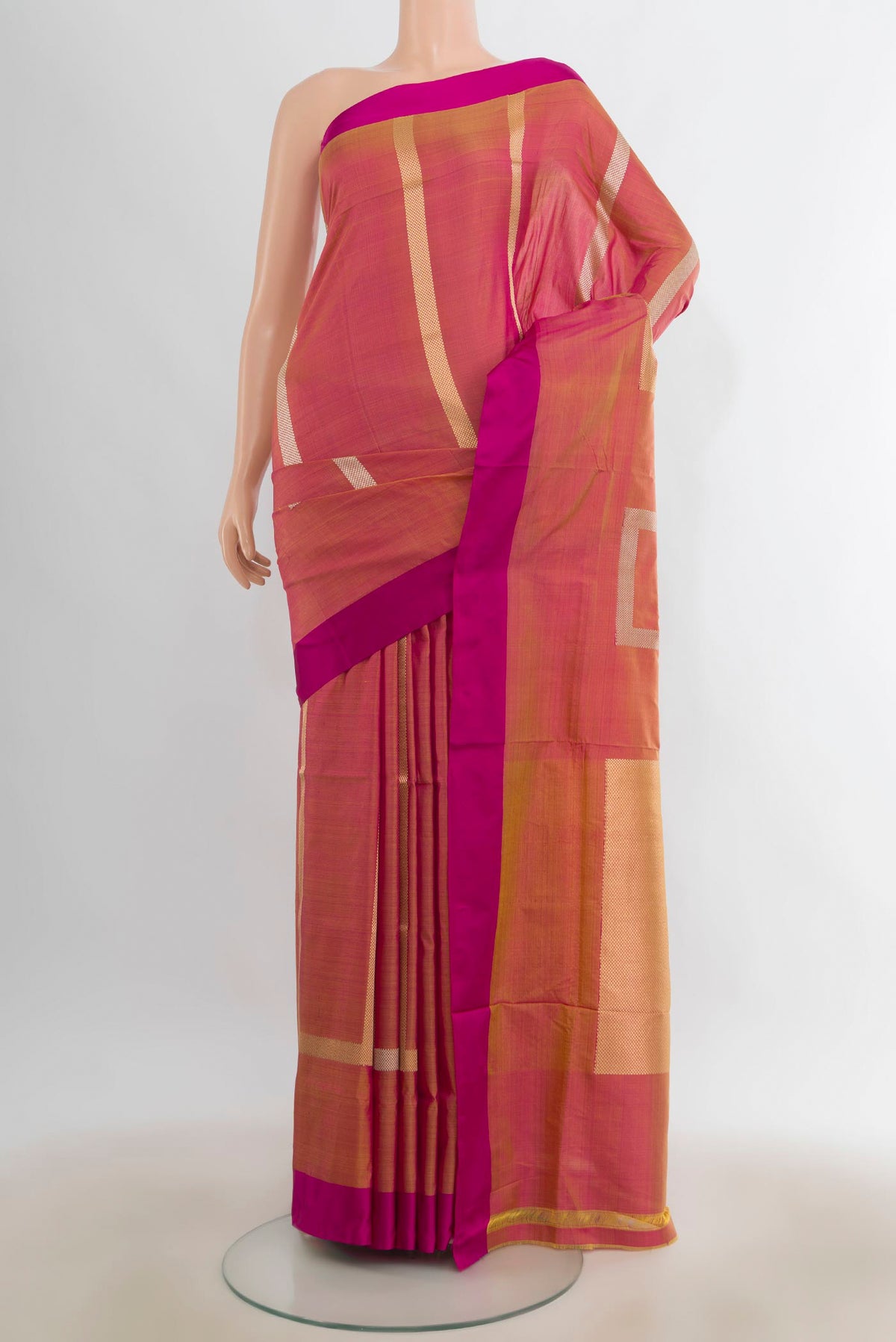 Pure Silk Pinkish Yellow Banarasi Katan Saree with Stripes on the body and Plain Border.  displayed on a mannequin