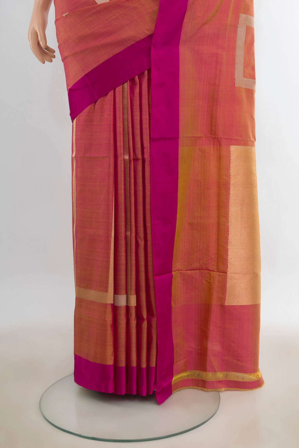 Pleats and pallu of Pure Silk Pinkish Yellow Banarasi Katan Saree with Stripes on the body and Plain Border. 