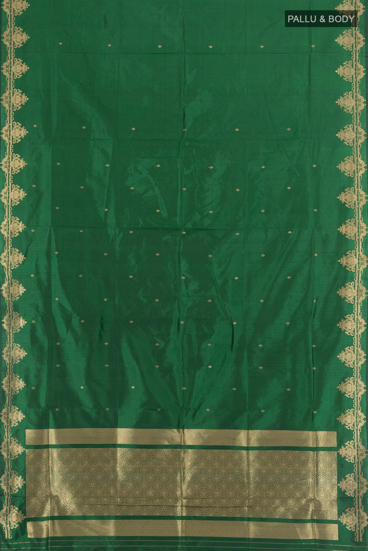 Flat view of Pure Silk Bottle Green Banarasi Katan Saree with Zari Butta on the body and Silk Border. 
