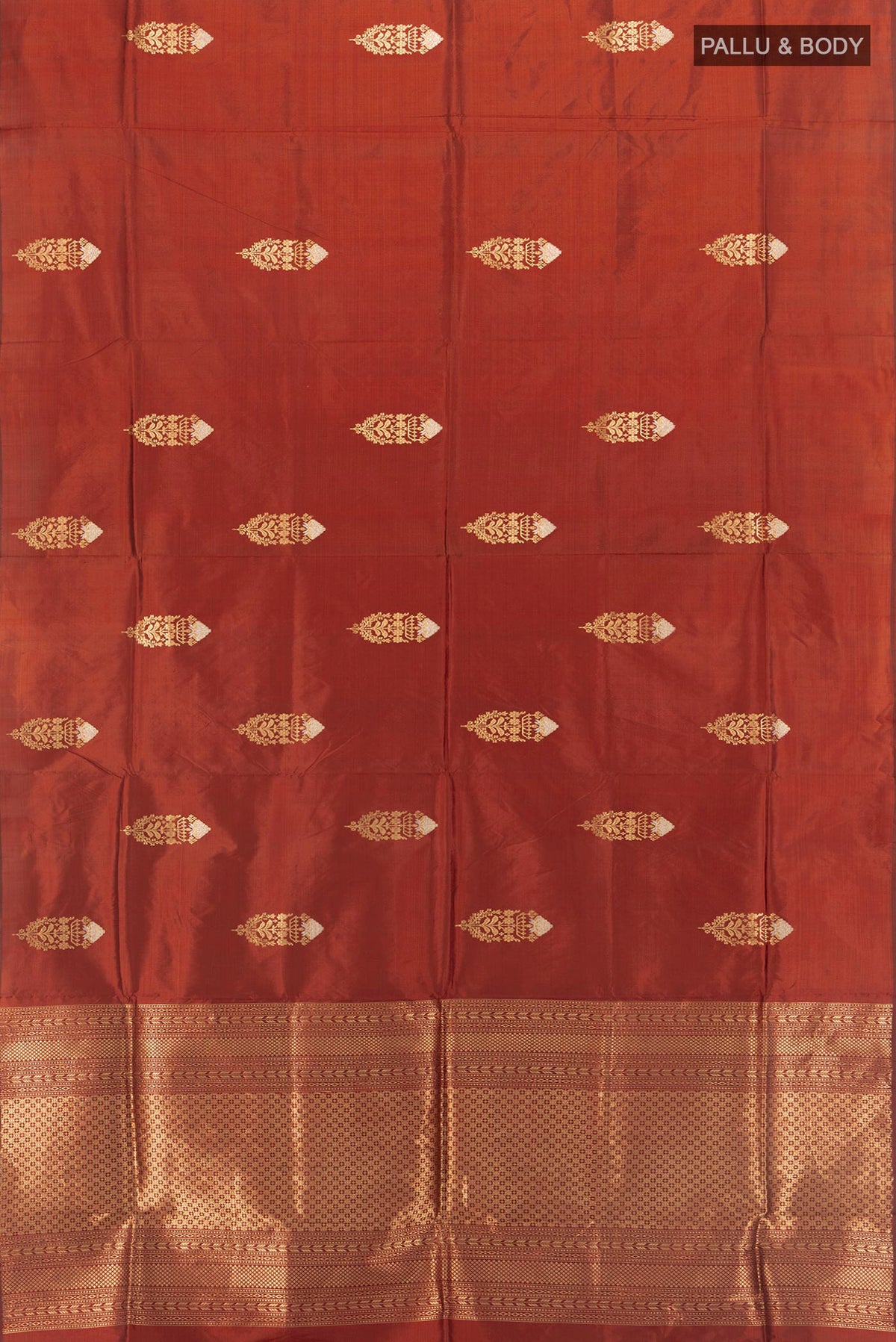 Flat view of Pure Silk Rust Banarasi Katan Saree with Zari Butta on the body and Without Border. 