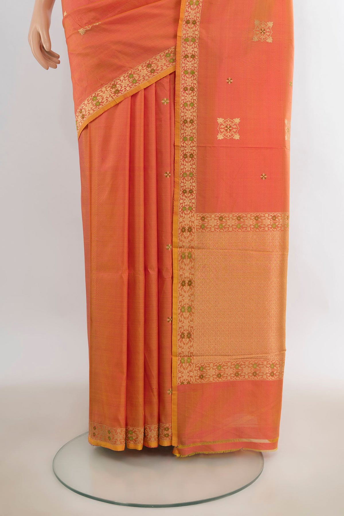 Pleats and pallu of Pure Silk Peach Banarasi Katan Saree with Zari Butta on the body and Zari Border. 
