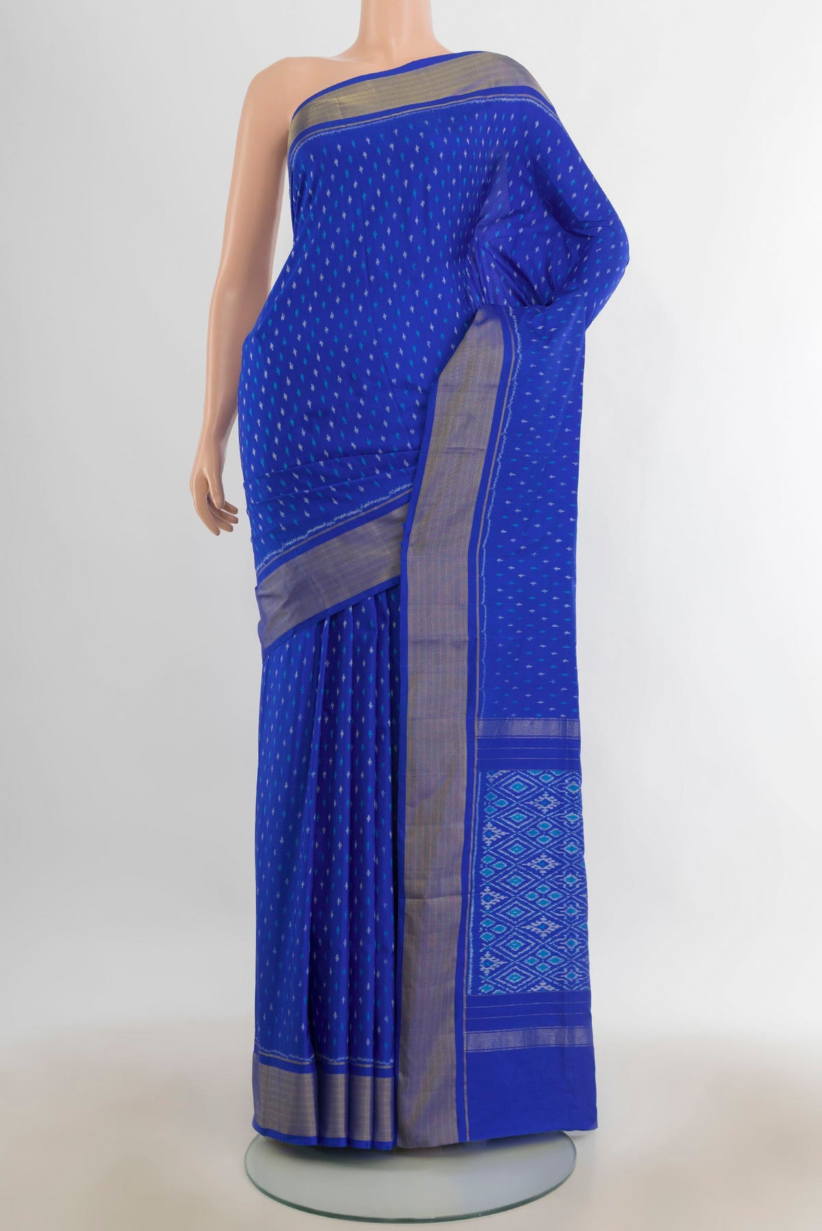 Pure Silk Multi Color Pochampally Saree with Ikat Print on the body and Silk Border.  displayed on a mannequin