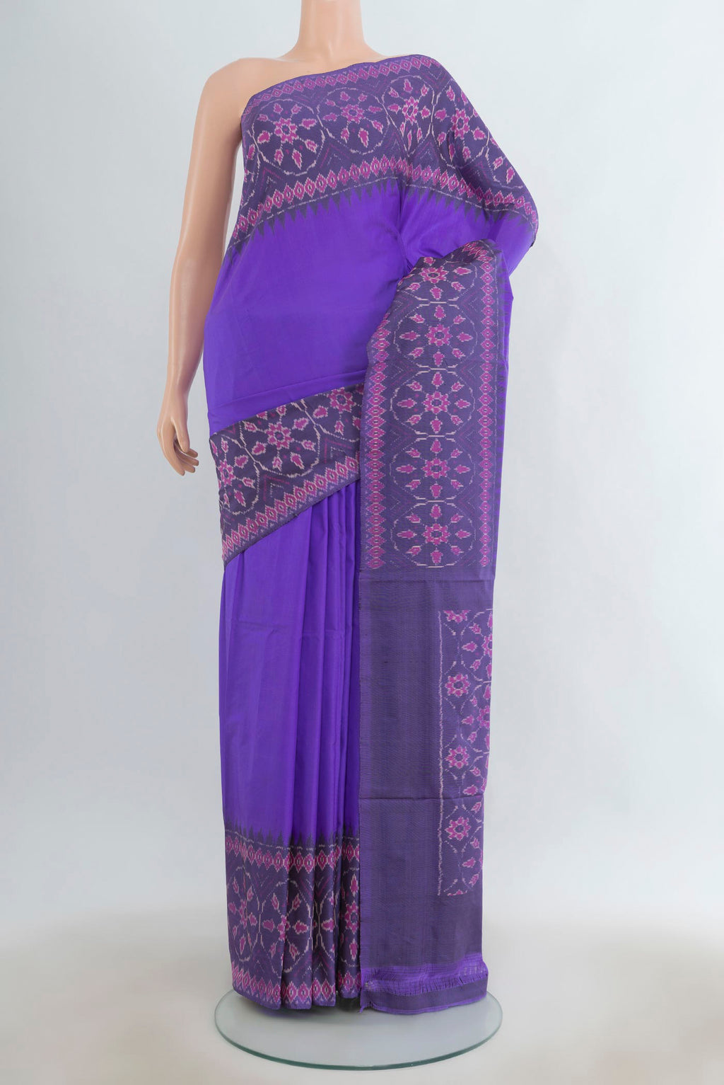 Pure Silk Lavender Pochampally Saree with Plain Body and Ikat Border.  displayed on a mannequin