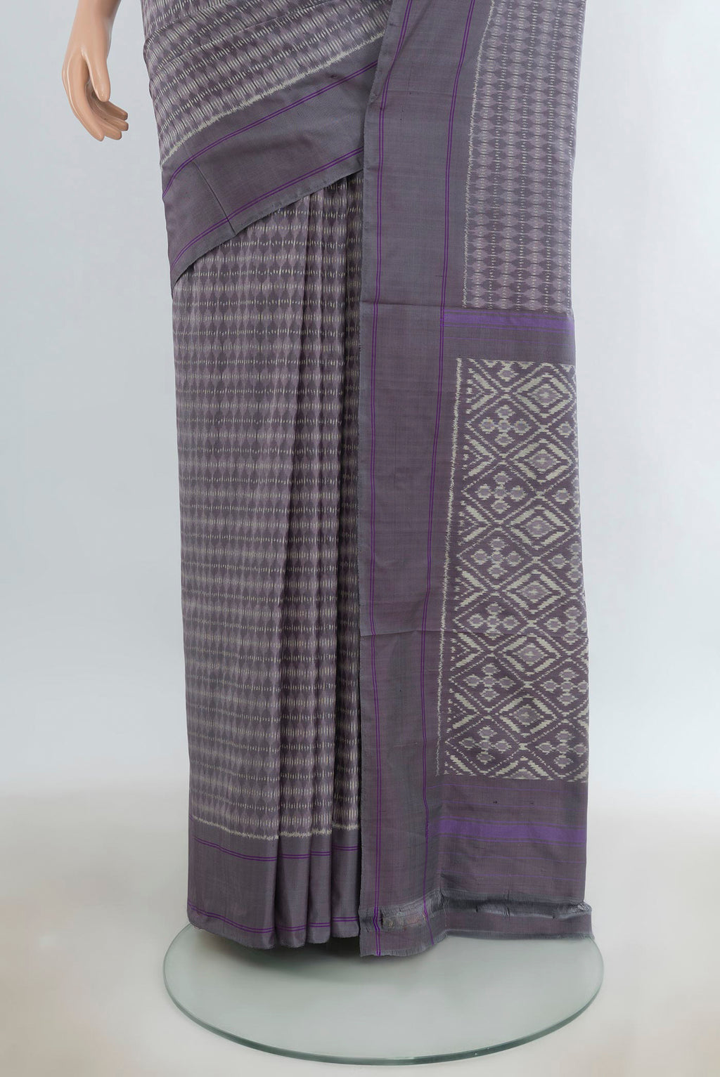 Pleats and pallu of Pure Silk Grey Pochampally Saree with Pure Ikat on the body and Plain Border. 