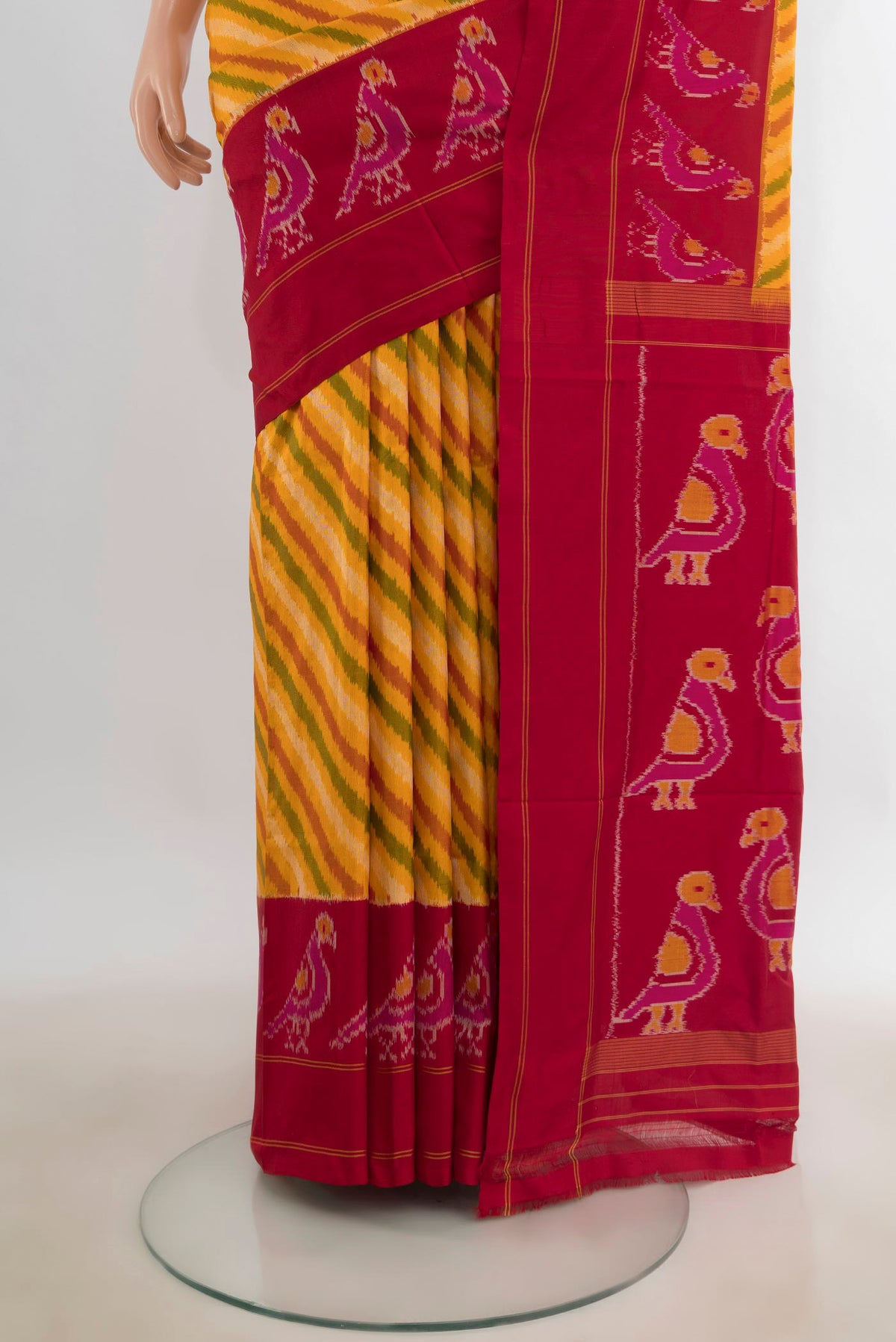 Pleats and pallu of Pure Silk Yellow Pochampally Saree with Pure Ikat on the body and Ikat Border. 