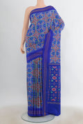 Pure Silk Royal Blue Pochampally Saree with Pure Ikat on the body and Plain Border.  displayed on a mannequin