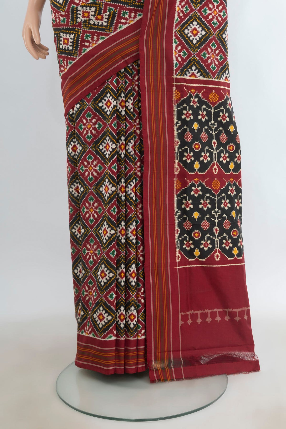 Pleats and pallu of Pure Silk Multi Color Double Ikat Saree with Pure Ikat on the body and Plain Border. 