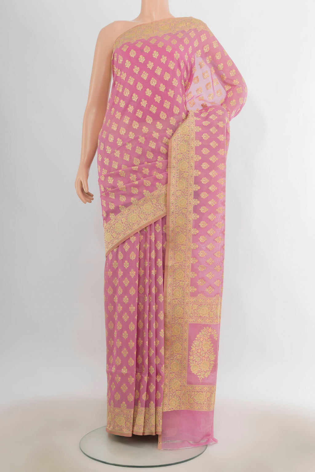 Pure Silk Rose pink Banarasi Saree with Zari Butta on the body and Zari Border.  displayed on a mannequin