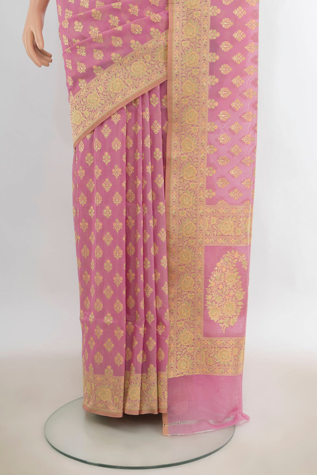 Pleats and pallu of Pure Silk Rose pink Banarasi Saree with Zari Butta on the body and Zari Border. 