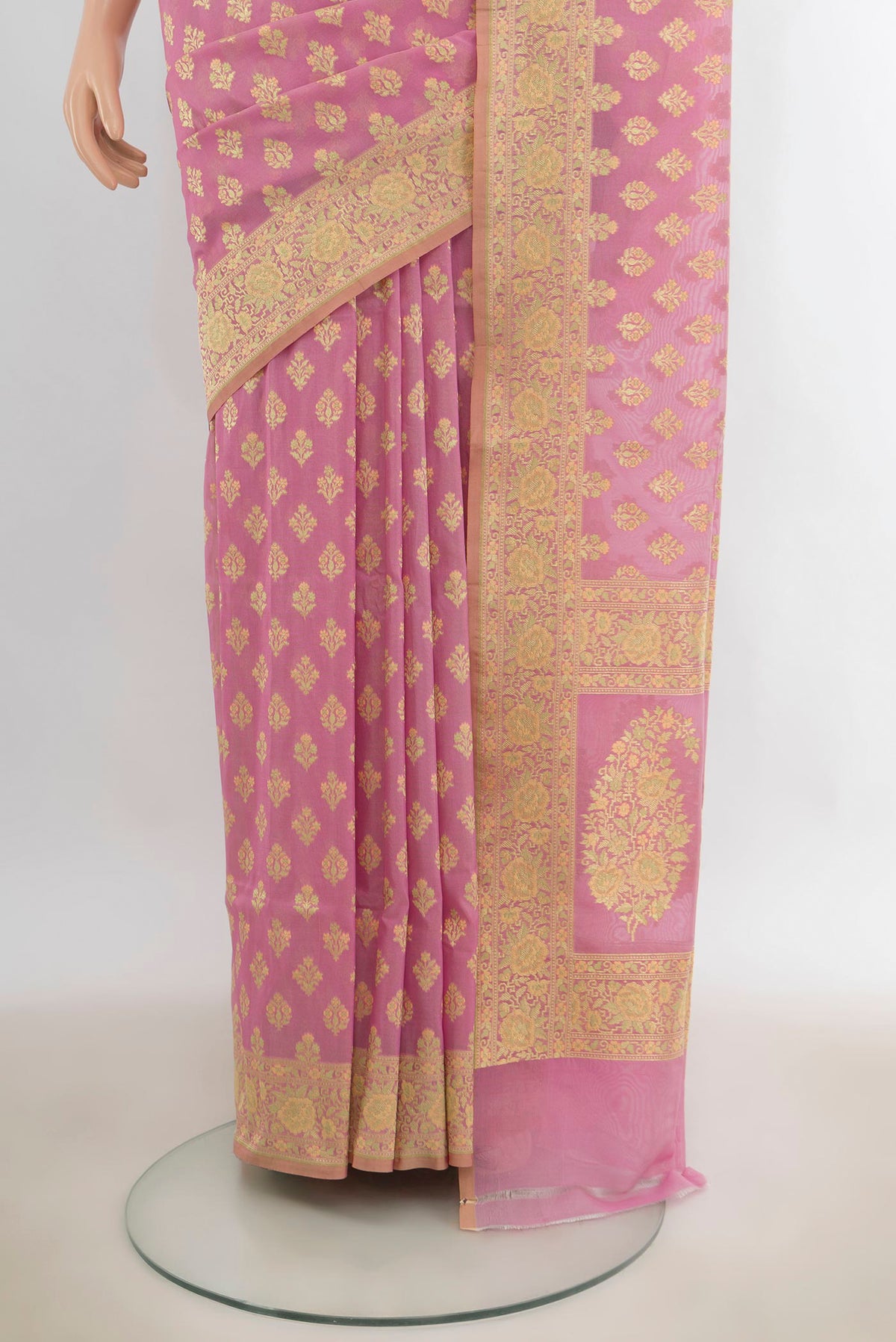 Pleats and pallu of Pure Silk Rose pink Banarasi Saree with Zari Butta on the body and Zari Border. 