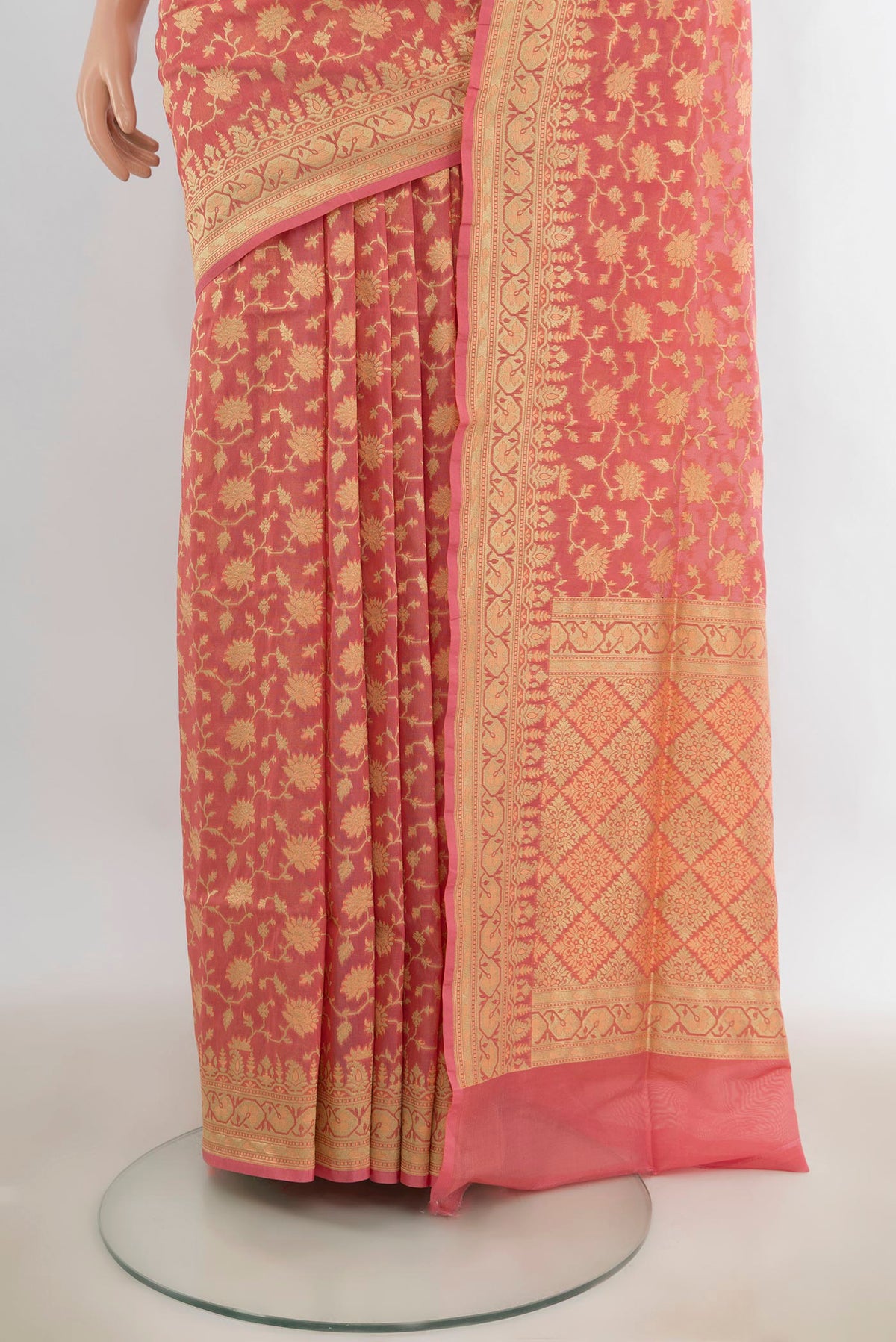 Pleats and pallu of Pure Silk Peach Banarasi Saree with Zari Butta on the body and Zari Border. 