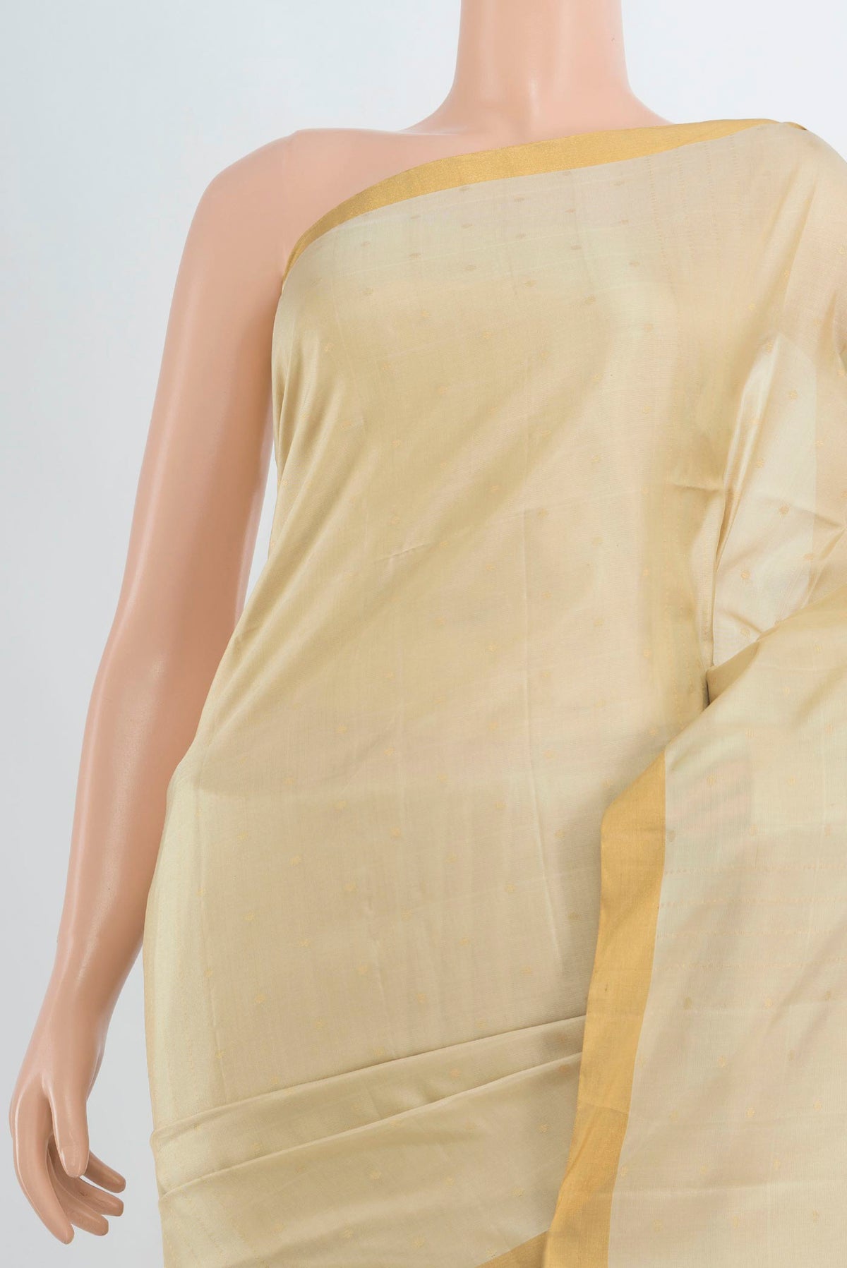 Border image of Pure Silk Golden Soft Saree with Zari Butta on the body and Silk Border. 