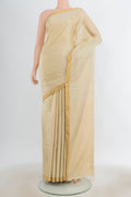 Pure Silk Golden Soft Saree with Zari Butta on the body and Silk Border.  displayed on a mannequin