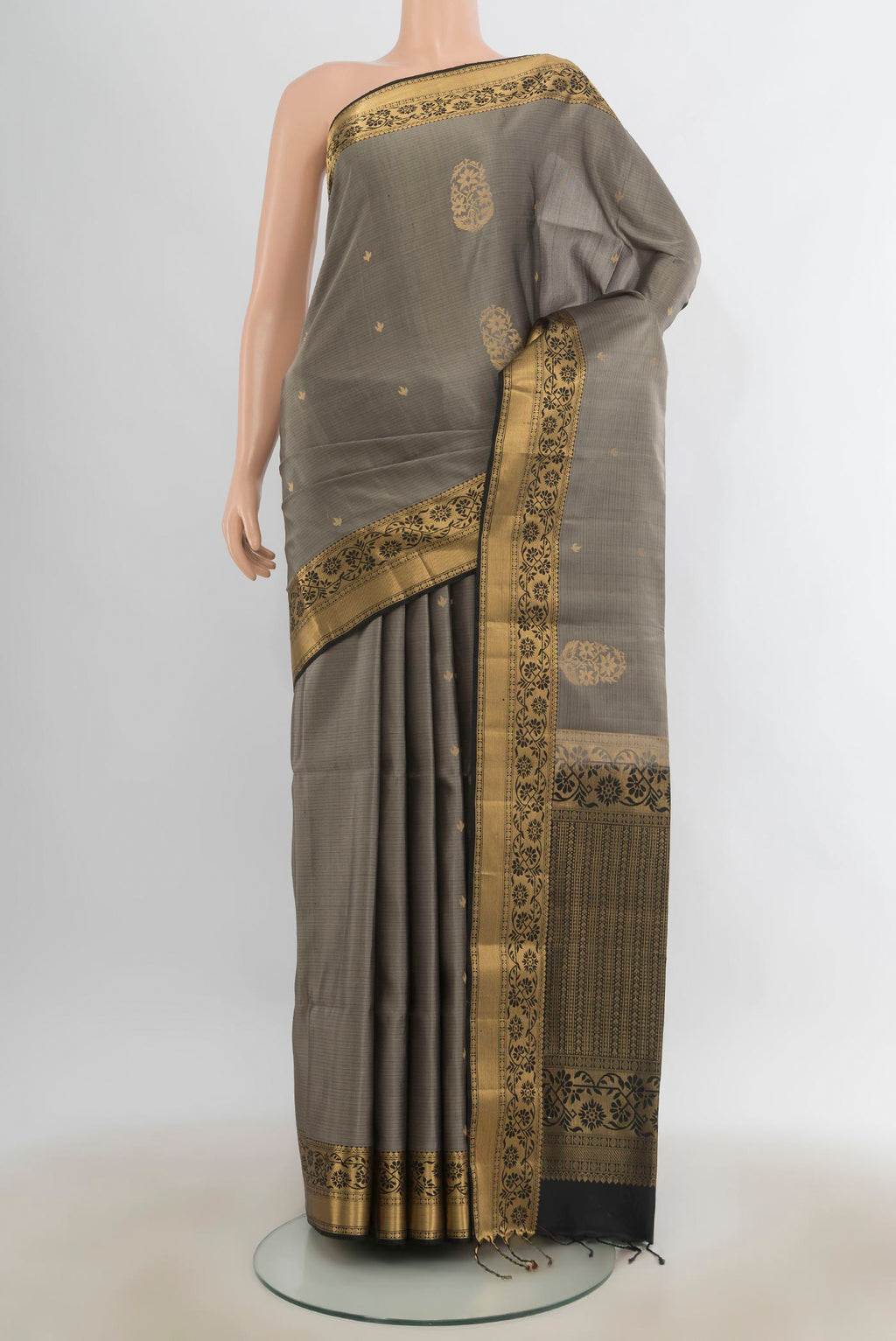 Pure Silk Davys Grey Soft Saree with Zari Butta on the body and Zari Border.  displayed on a mannequin