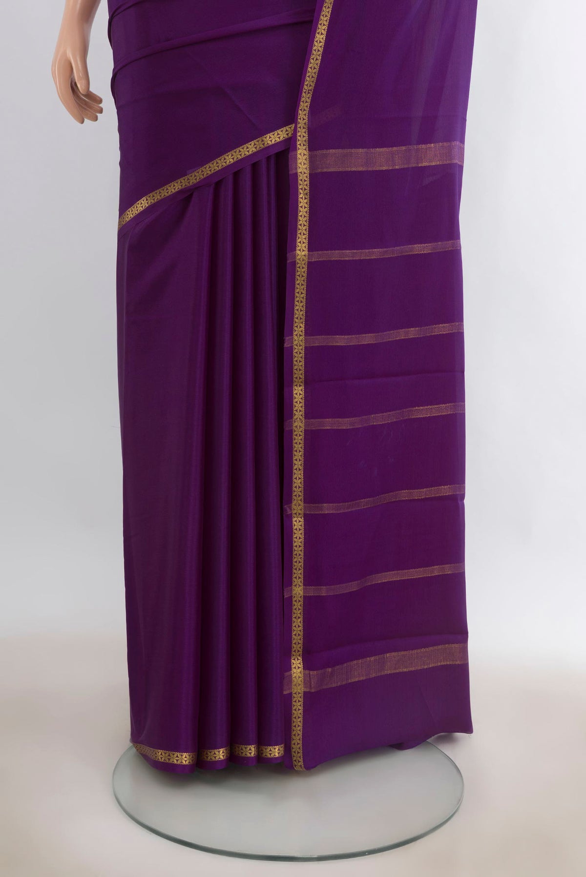 Pleats and pallu of Violet Mysore Crepe Saree with Plain Body and Zari Border. 