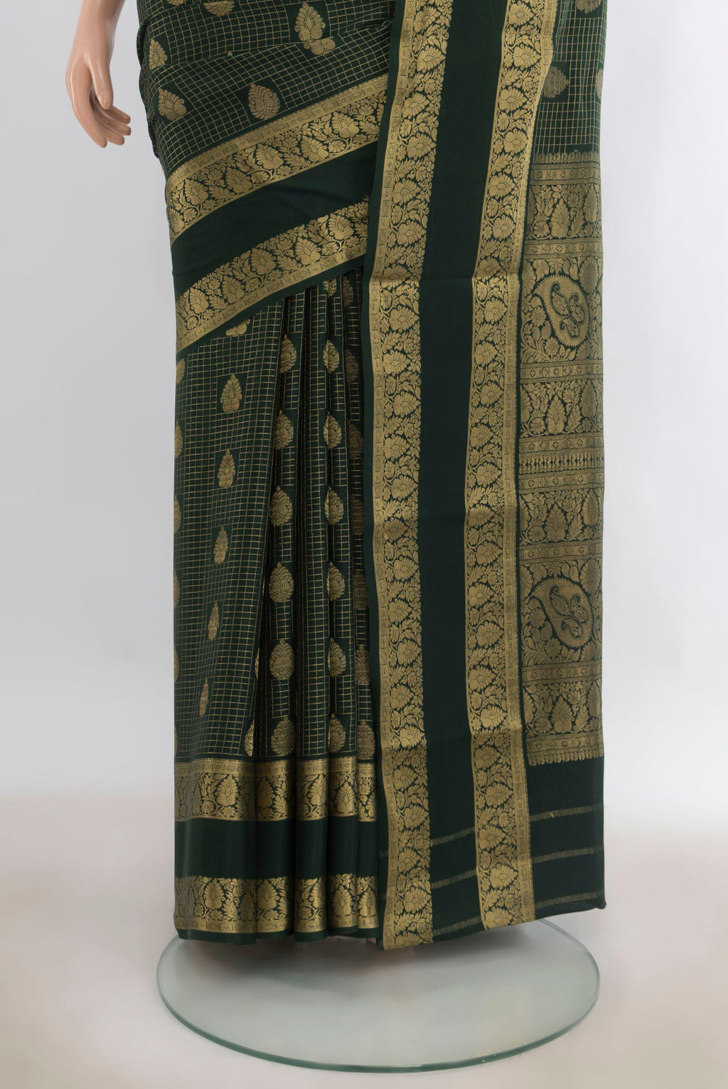 Pleats and pallu of Bottle Green Mysore Crepe Saree with Checked design on the body and Zari Border. 