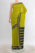 Light Green Mysore Crepe Saree with Zari Butta on the body and Silk Border.  displayed on a mannequin