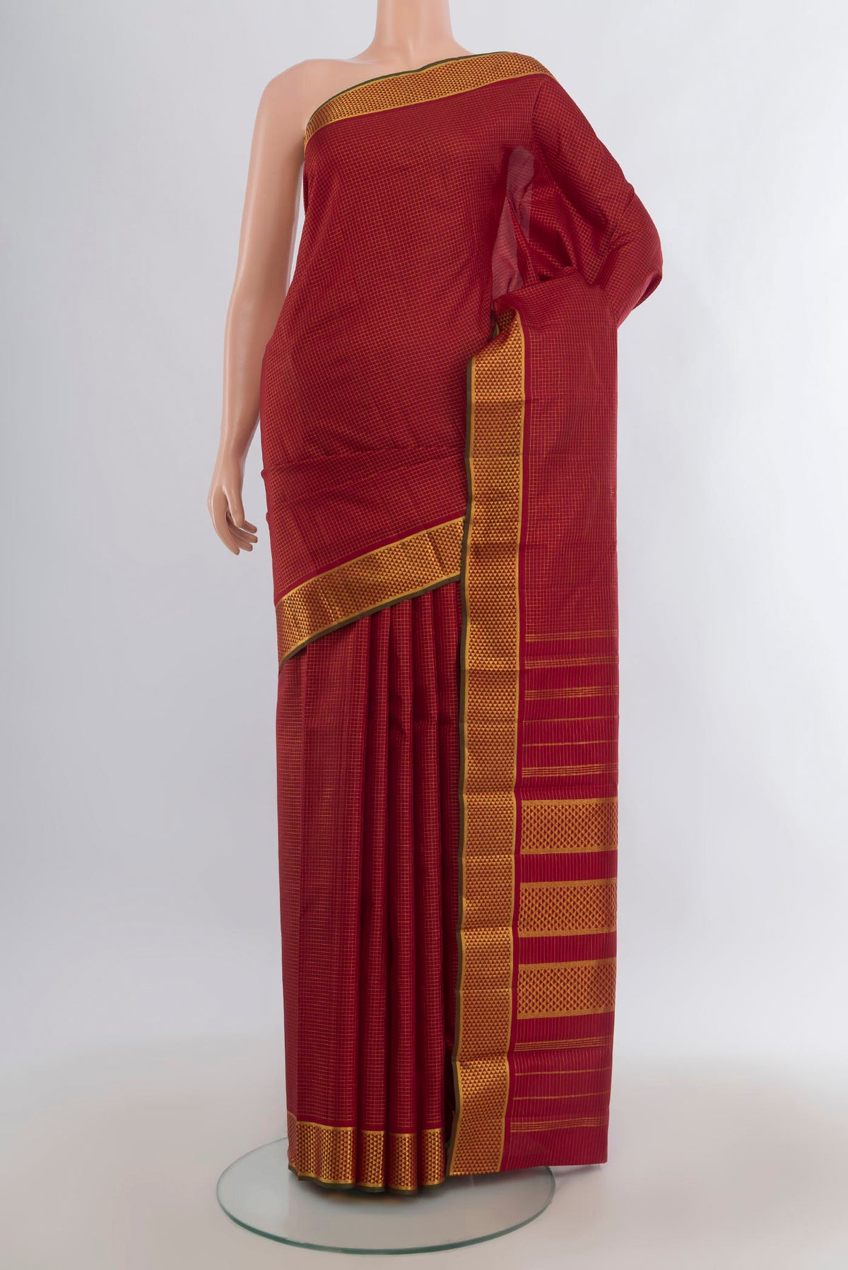 Pure Silk Maroon Kanchipuram Saree with Checked design on the body and Zari Border.  displayed on a mannequin