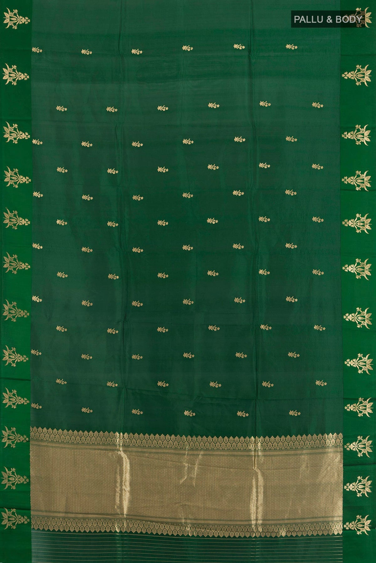 Flat view of Pure Silk Bottle Green Banarasi Katan Saree with Zari Butta on the body and Plain Border. 