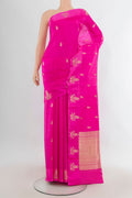 Pure Silk Rani Pink Banarasi Katan Saree with Zari Butta on the body and Satin Border.  displayed on a mannequin
