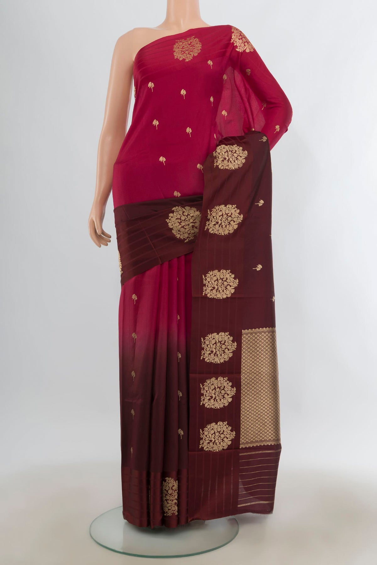 Pure Silk Multi Color Banarasi Katan Saree with Zari Butta on the body and Plain Border.  displayed on a mannequin