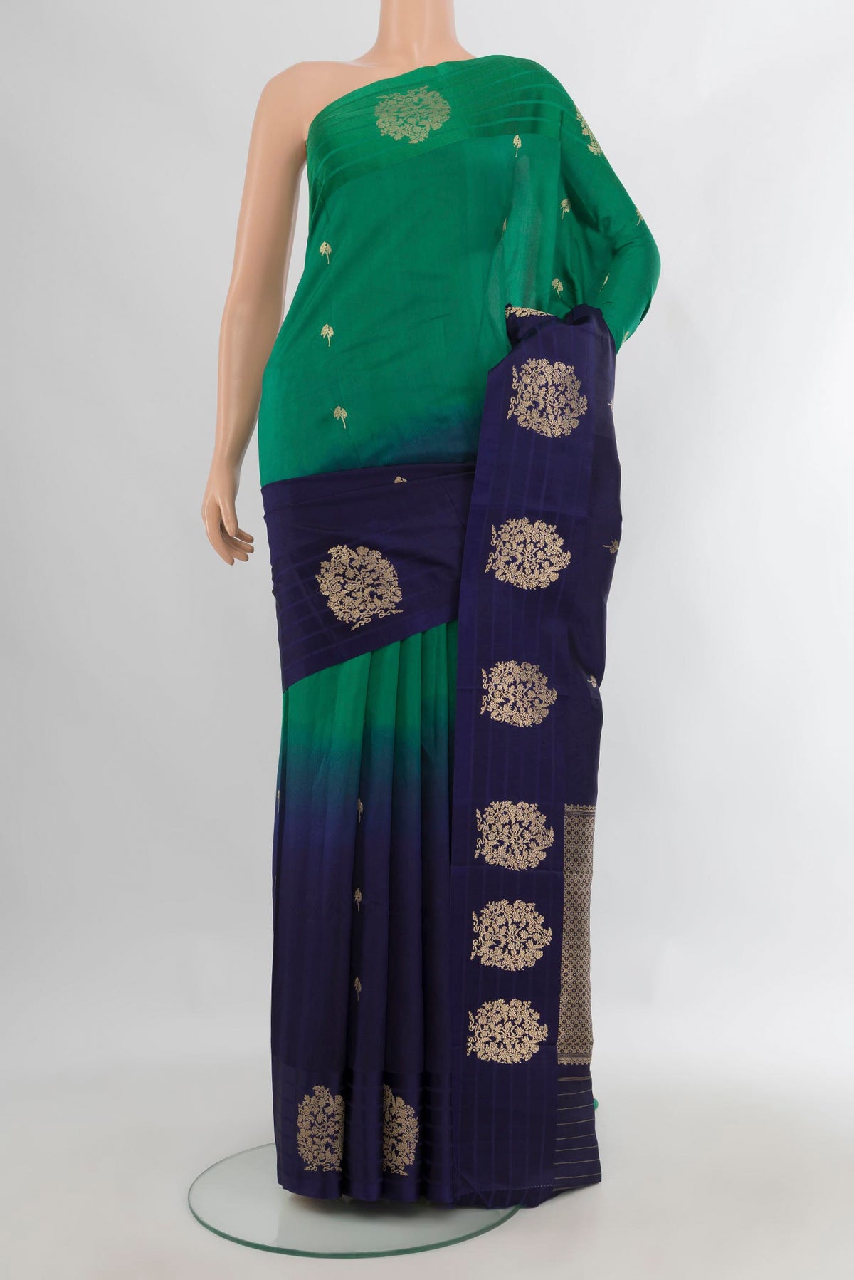 Pure Silk Multi Color Banarasi Katan Saree with Zari Butta on the body and Plain Border.  displayed on a mannequin