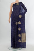 Navy Blue Banarasi Katan Silk Saree with Checked design on the body and Fancy Border.  displayed on a mannequin