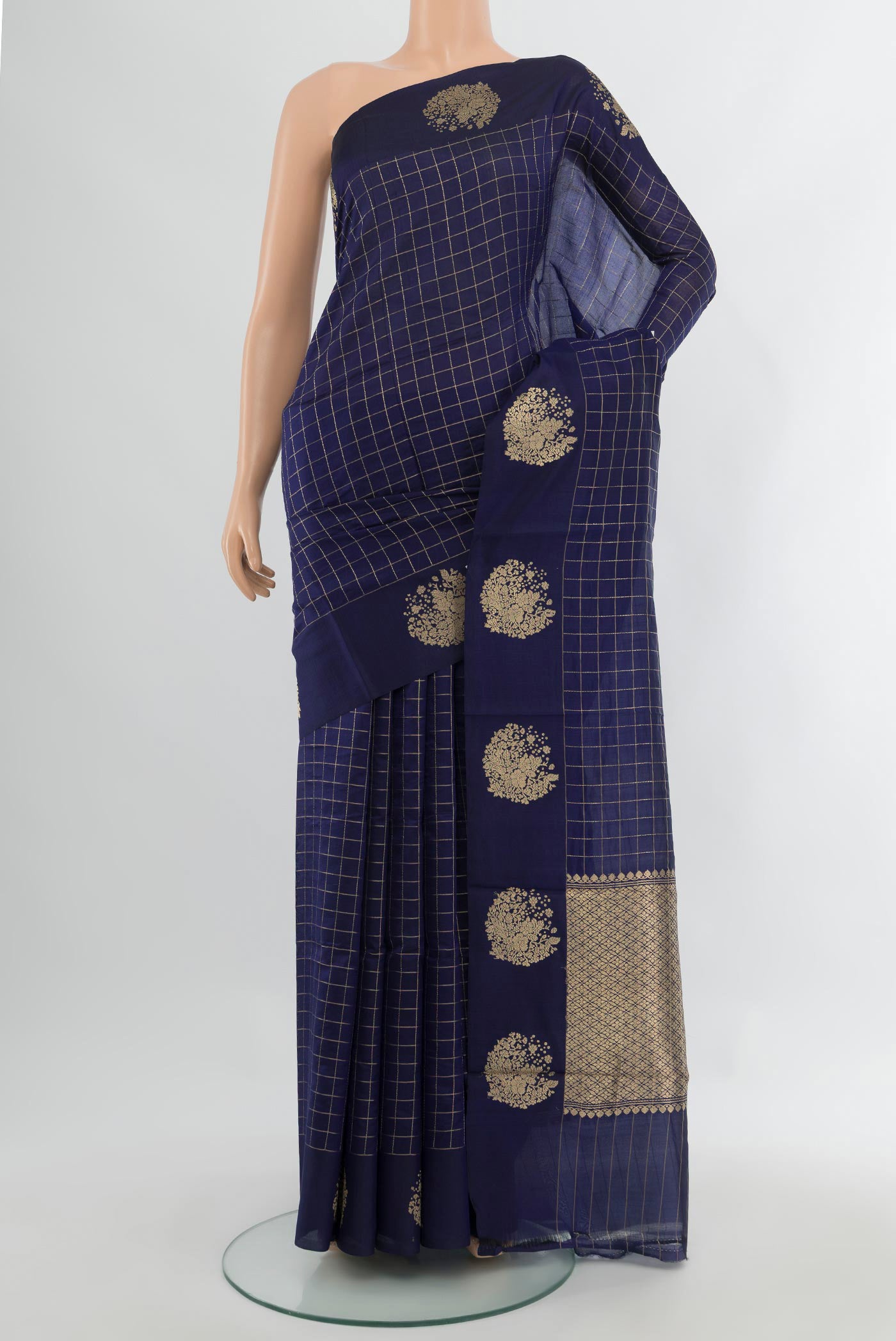 Navy Blue Banarasi Katan Silk Saree with Checked design on the body and Fancy Border.  displayed on a mannequin