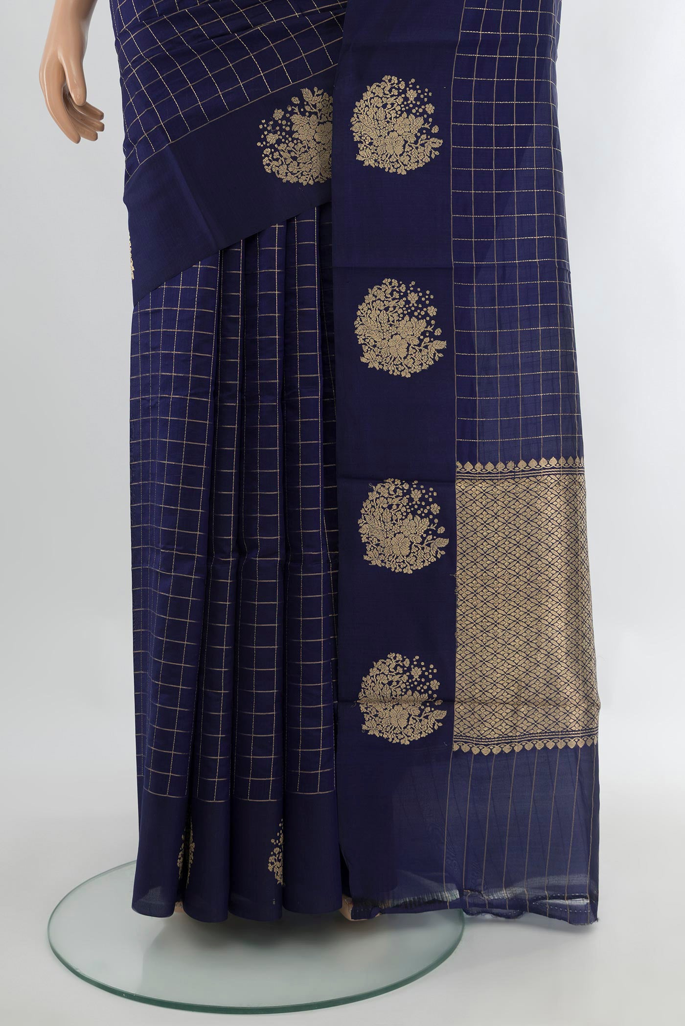 Pleats and pallu of Navy Blue Banarasi Katan Silk Saree with Checked design on the body and Fancy Border. 
