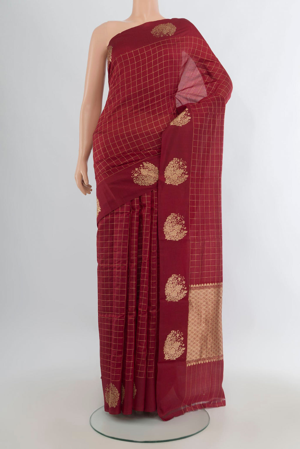 Pure Silk Maroon Banarasi Katan Saree with Stripes on the body and Zari Border.  displayed on a mannequin
