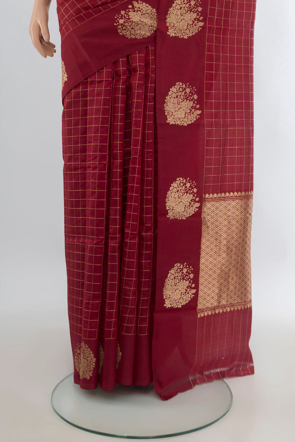 Pleats and pallu of Pure Silk Maroon Banarasi Katan Saree with Stripes on the body and Zari Border. 