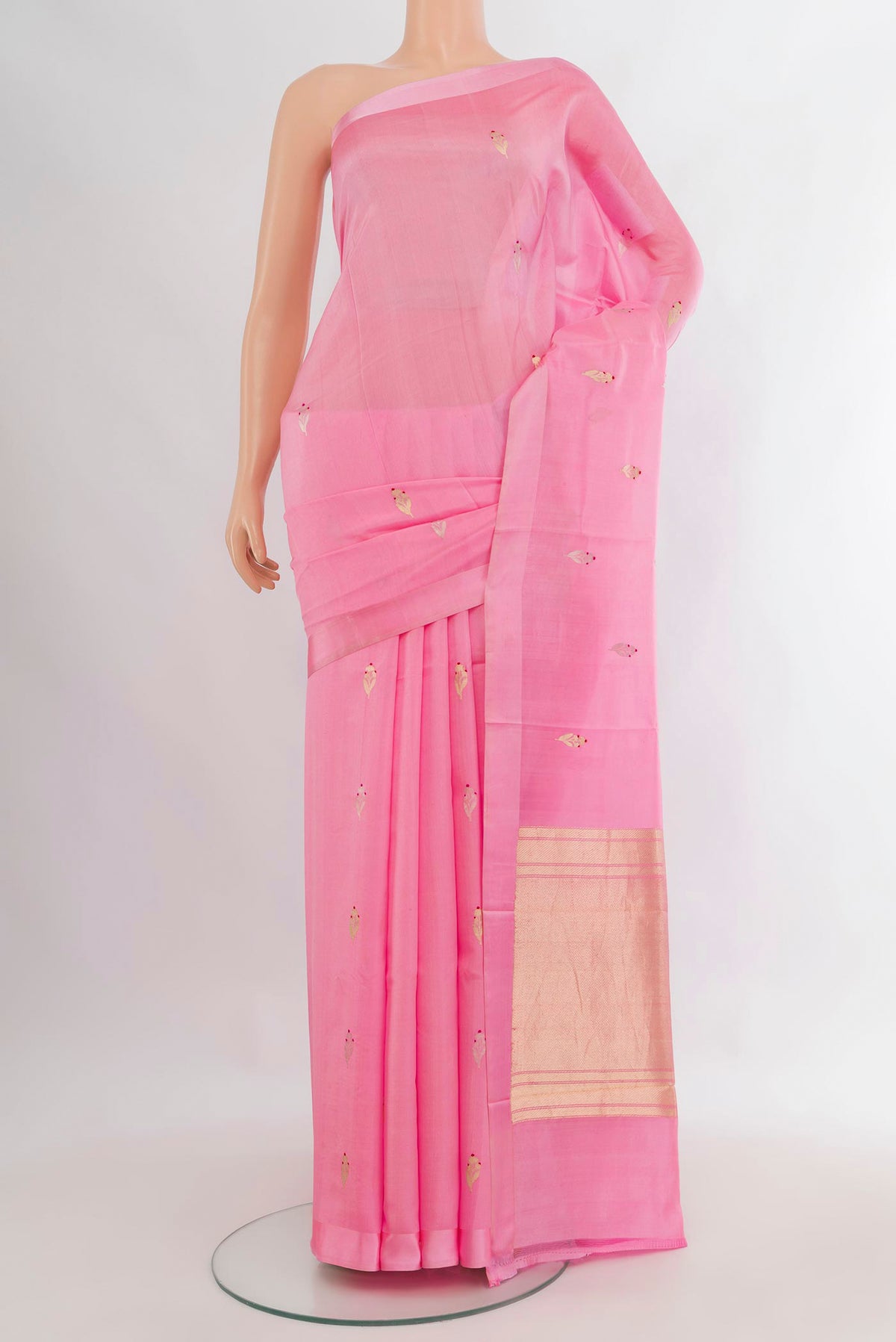 Pure Silk Rose pink Banarasi Katan Saree with Zari Butta on the body and Plain Border.  displayed on a mannequin