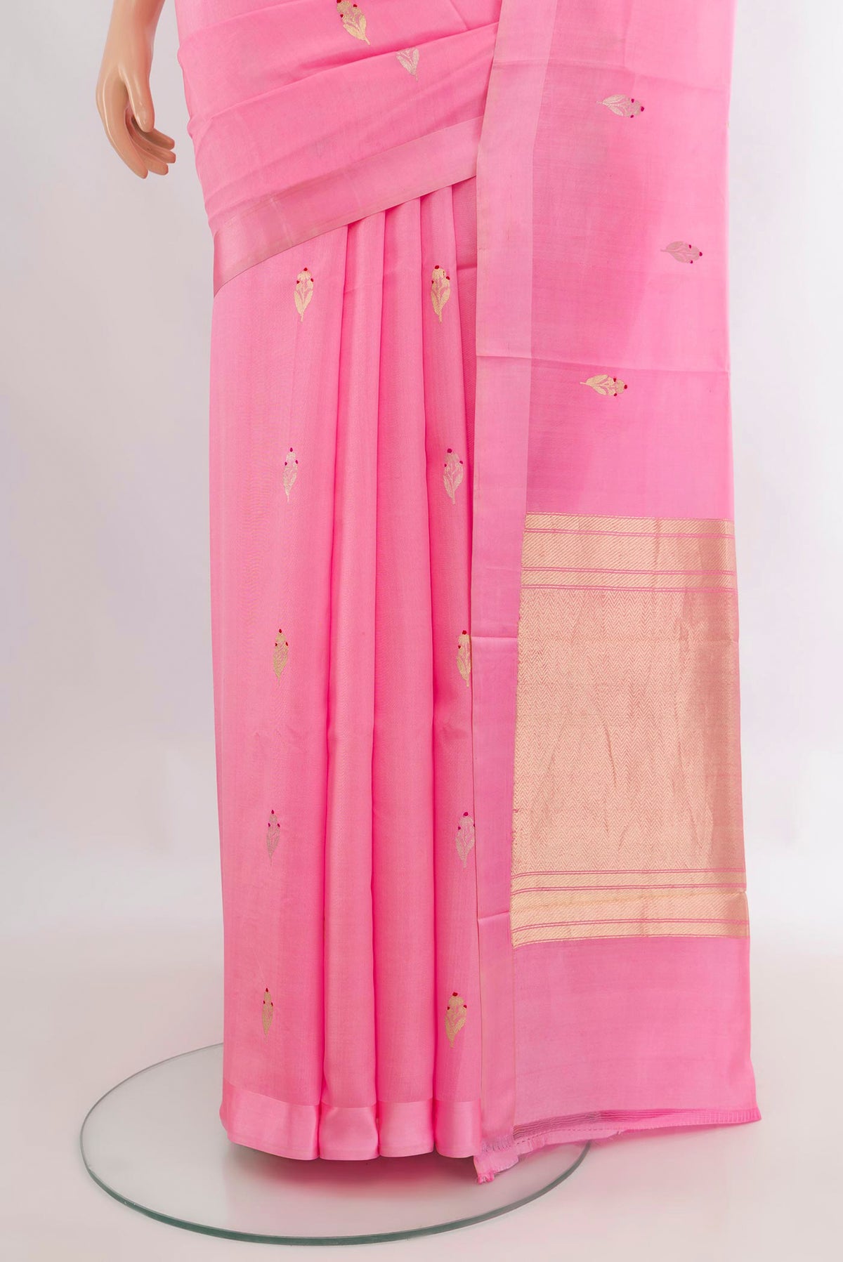 Pleats and pallu of Pure Silk Rose pink Banarasi Katan Saree with Zari Butta on the body and Plain Border. 