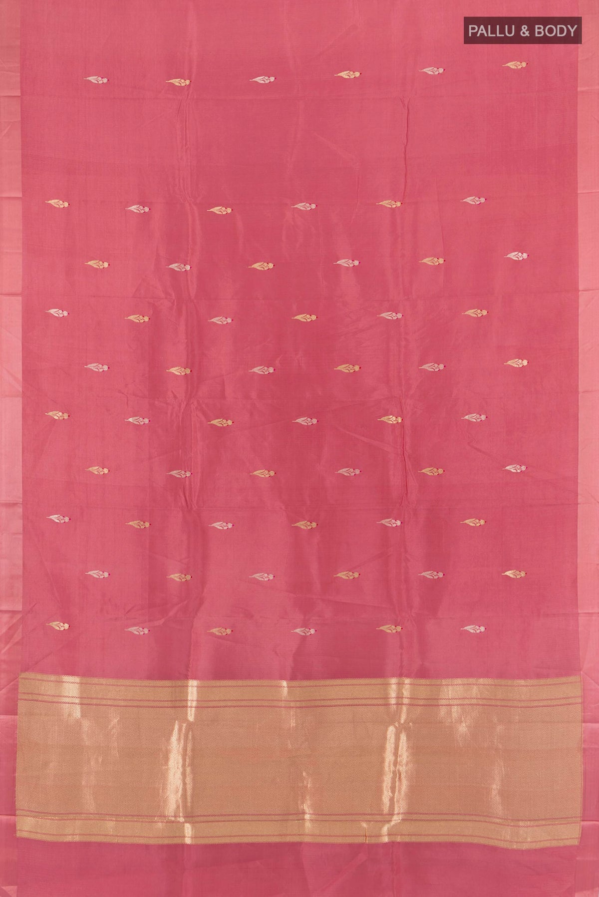 Flat view of Pure Silk Rose Gold Banarasi Katan Saree with Zari Butta on the body and Plain Border. 