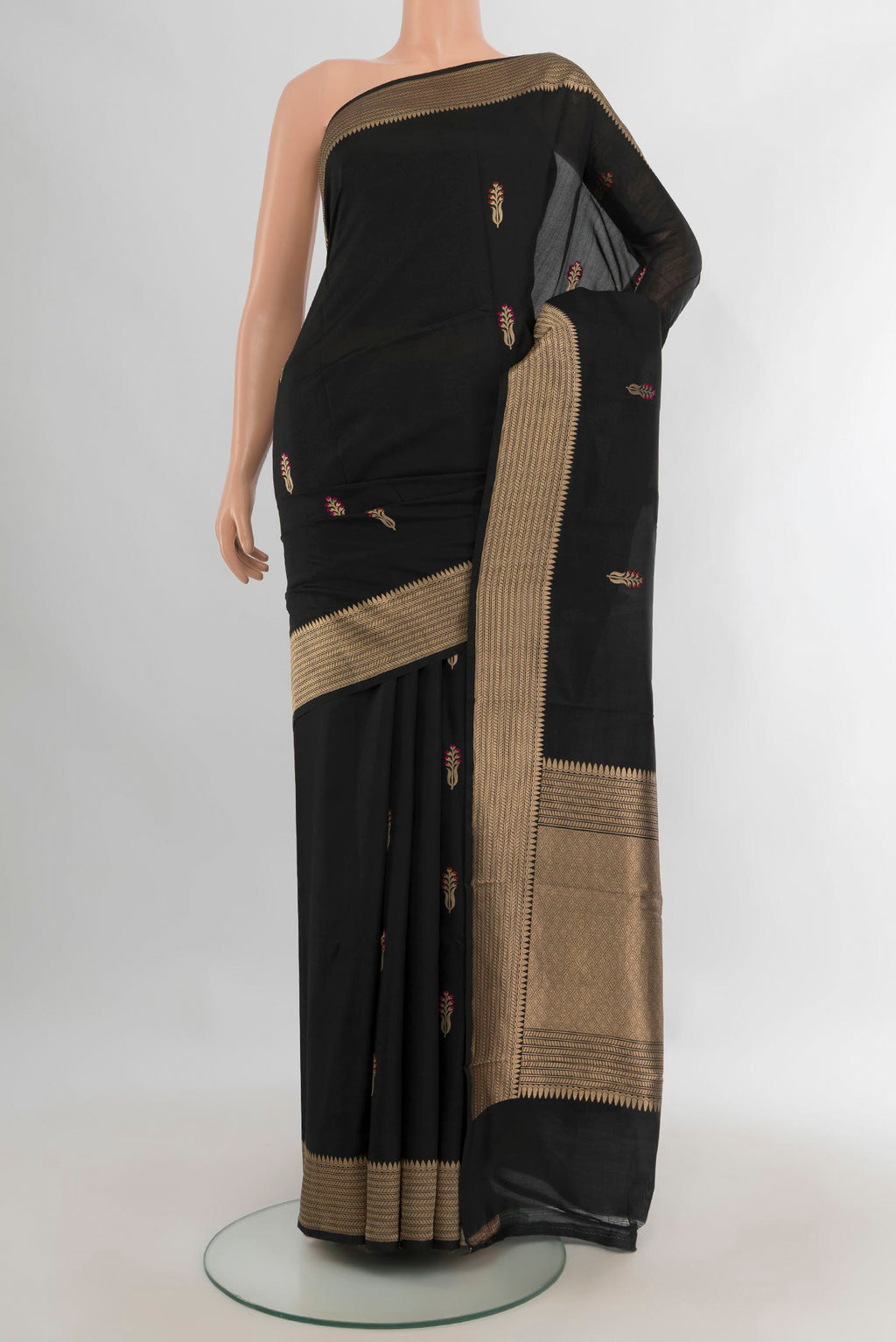 Pure Silk Black Banarasi Saree with Zari Butta on the body and Zari Border.  displayed on a mannequin