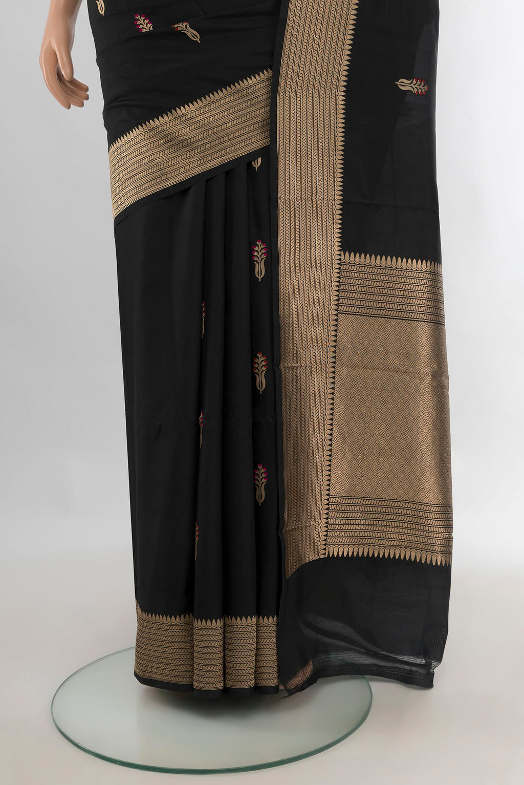 Pleats and pallu of Pure Silk Black Banarasi Saree with Zari Butta on the body and Zari Border. 