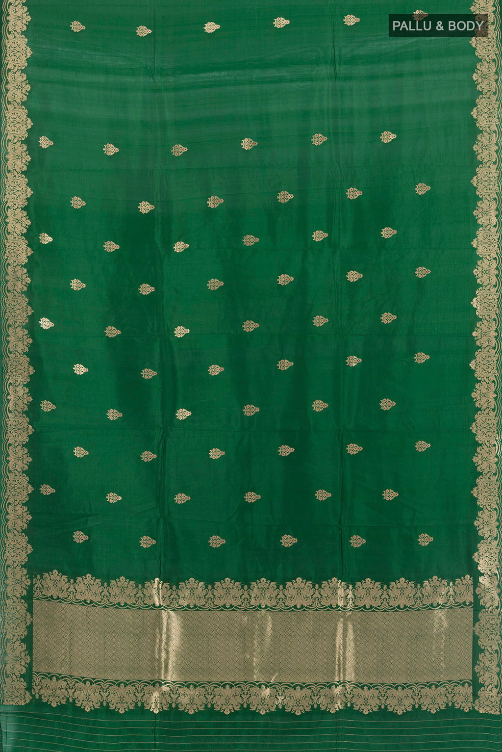 Flat view of Pure Silk Bottle Green Banarasi Katan Saree with Zari Butta on the body and Fancy Border. 