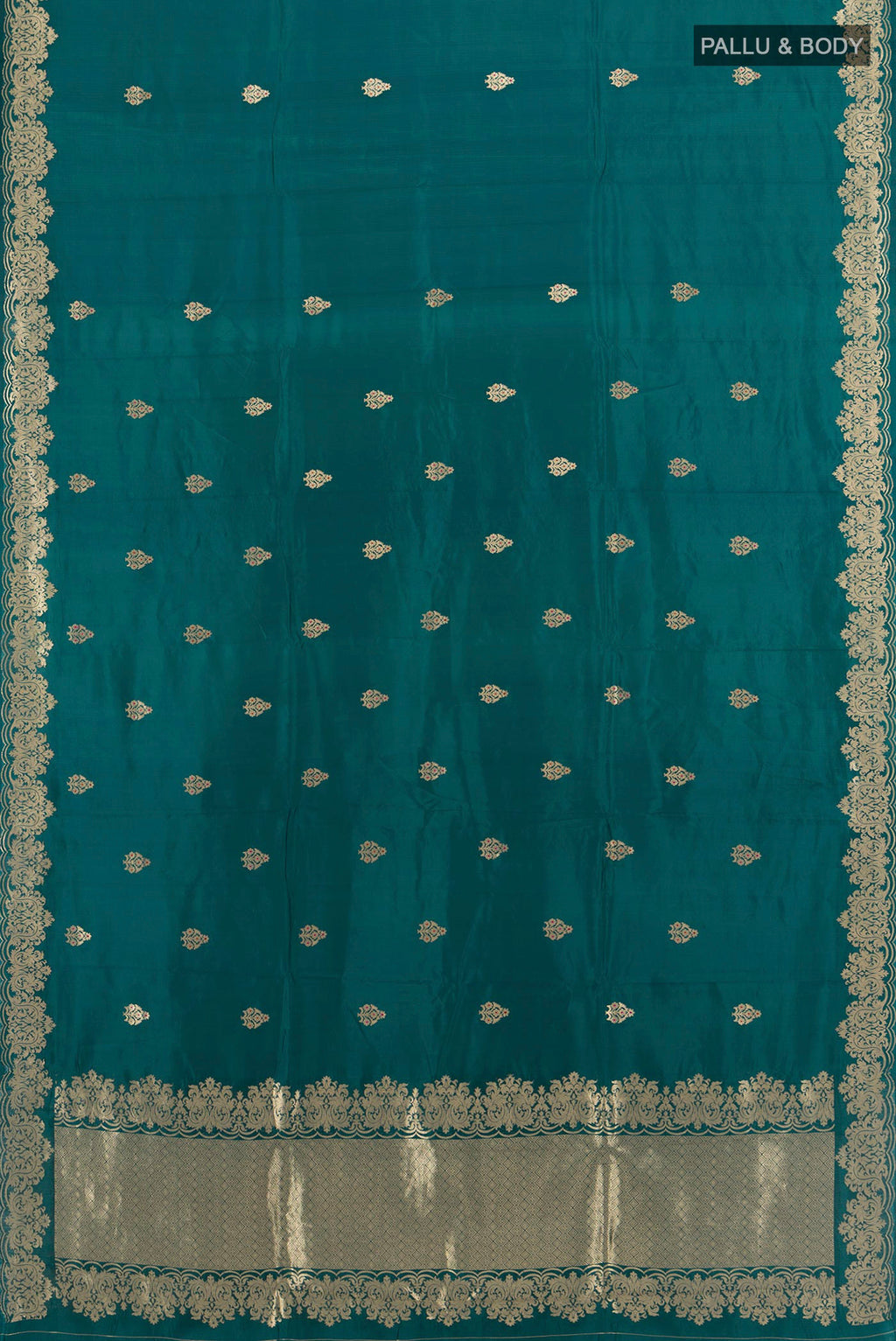 Flat view of Pure Silk Blue Banarasi Katan Saree with Zari Butta on the body and Zari Border. 