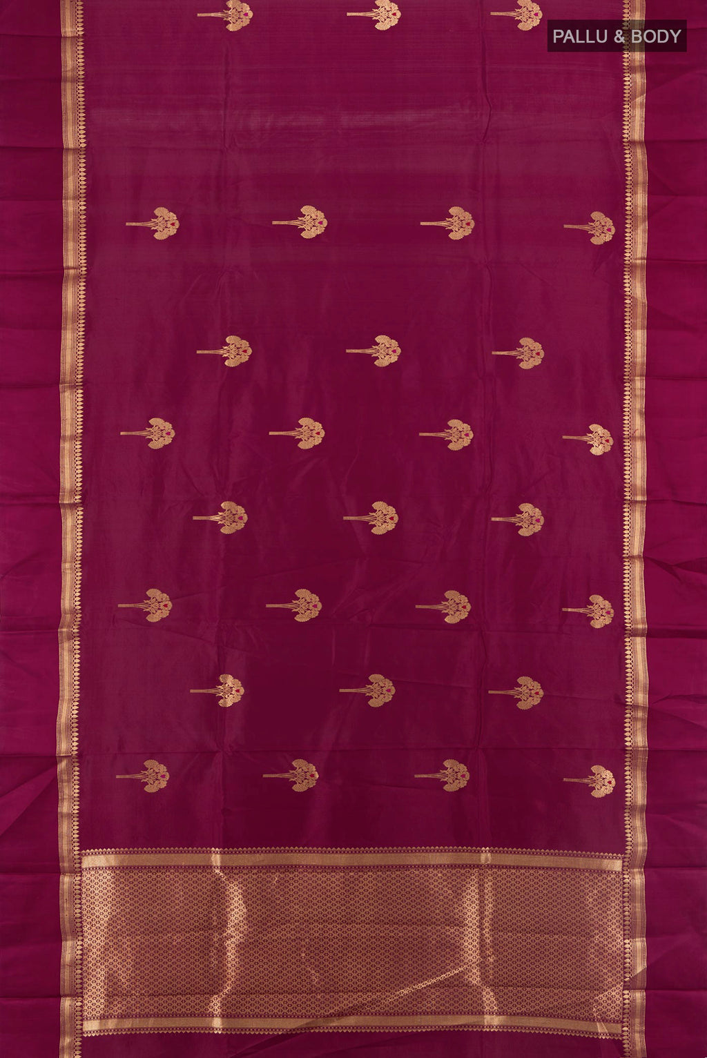 Flat view of Magenta Banarasi Katan Silk Saree with Zari Butta on the body and Zari Border. 