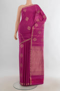 Pure Silk Pure Zari Purple Soft Saree with Zari Butta on the body and Silk Border.  displayed on a mannequin