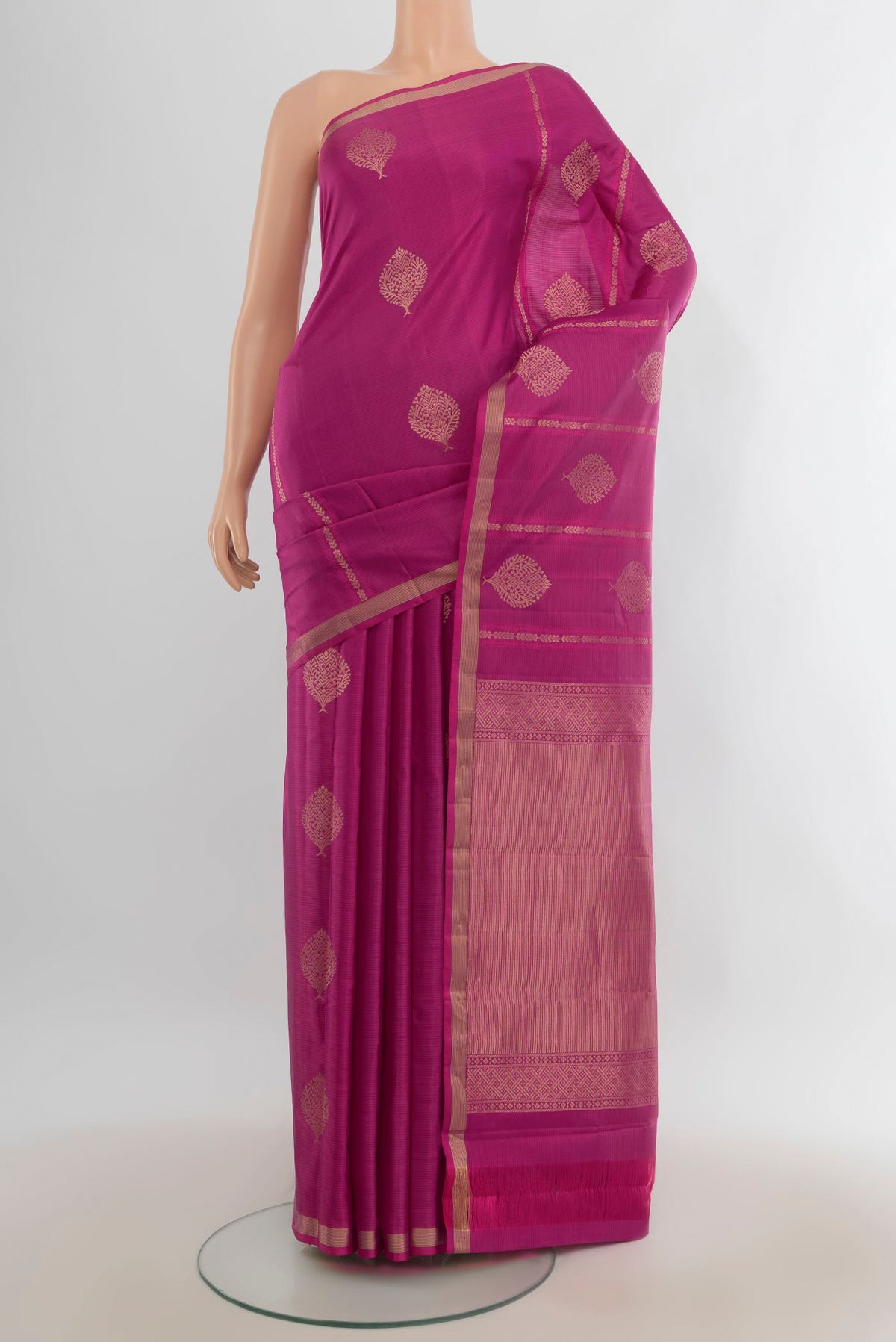Pure Silk Pure Zari Purple Soft Saree with Zari Butta on the body and Silk Border.  displayed on a mannequin