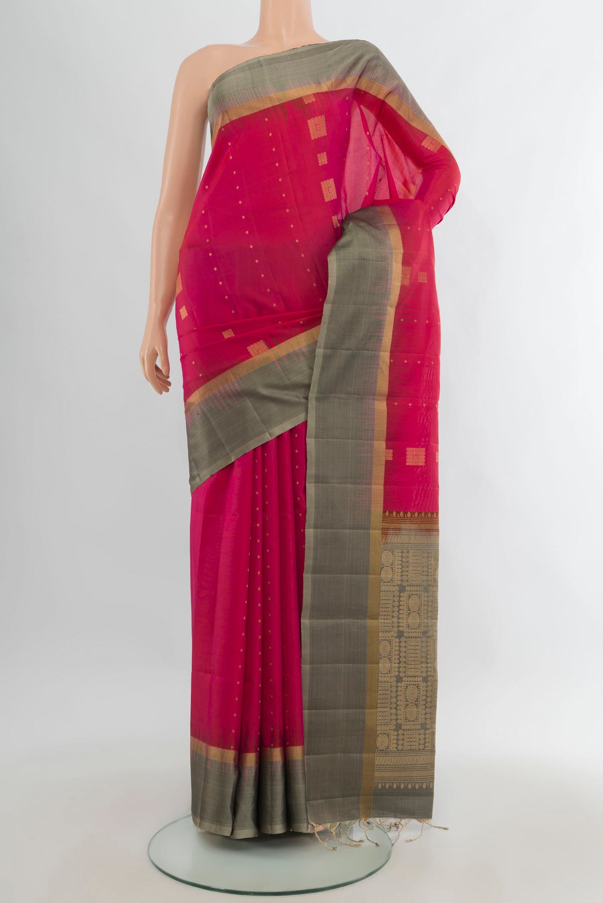 Pure Silk Dark Pink Soft Saree with Zari Butta on the body and Plain Border.  displayed on a mannequin