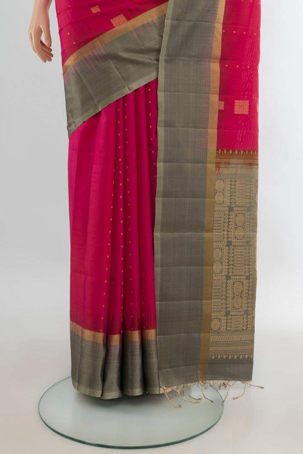 Pleats and pallu of Pure Silk Dark Pink Soft Saree with Zari Butta on the body and Plain Border. 