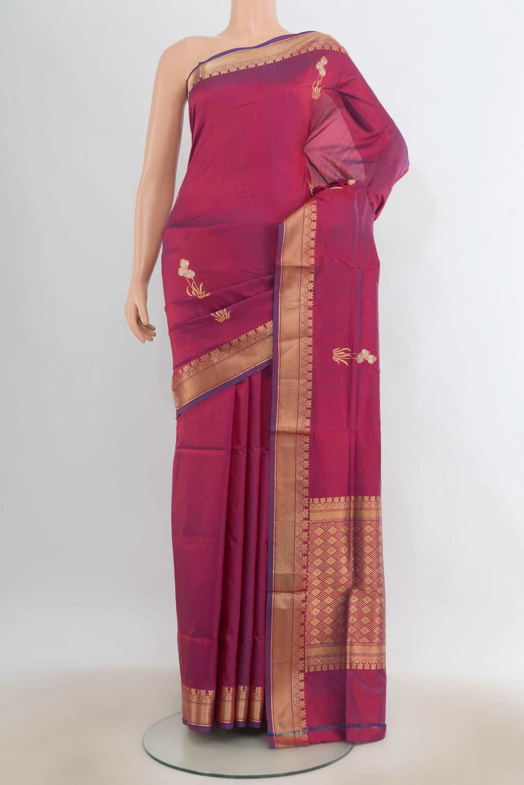 Pure Silk Magenta Banarasi Katan Saree with Zari Butta on the body and Zari Border.  displayed on a mannequin