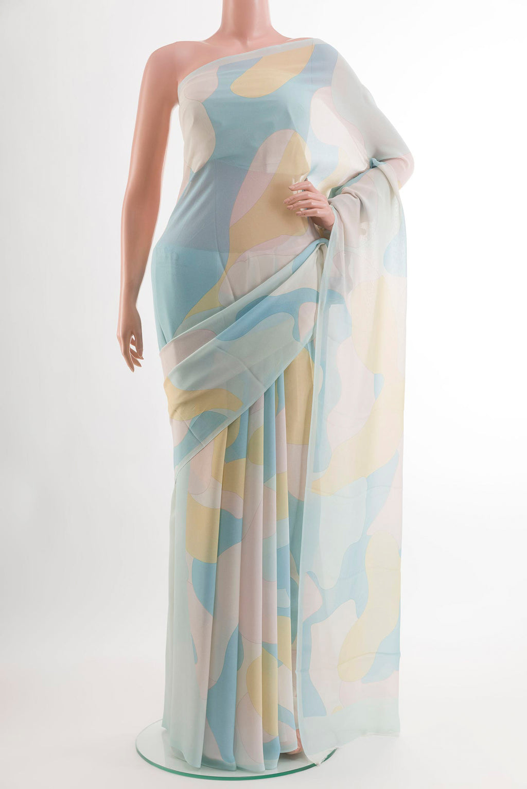 Blue Chiffon Saree with Zari Butta on the body and Zari Border.  displayed on a mannequin